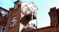 Vorsatzbalkon mit Regenschutzdach